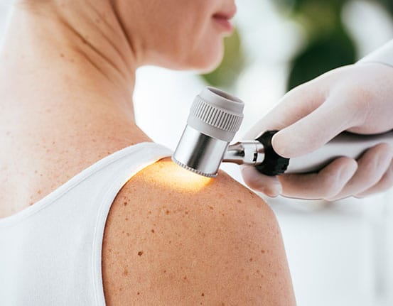 STARS-D_Tile A dermatologist examines a patient's shoulder with a scope