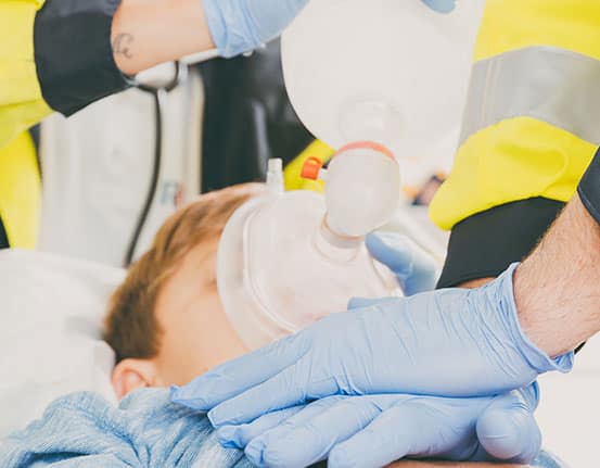 STARS-PPC_Tile Emergency medical technicians give chest compressions to a pediatric patient